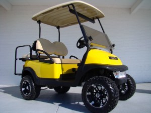 Yellow Lifted Club Car Precedent Golf Cart